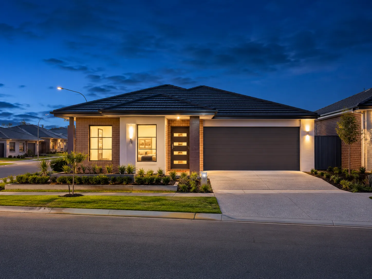 Completed single-storey Australian volume-built home at dusk